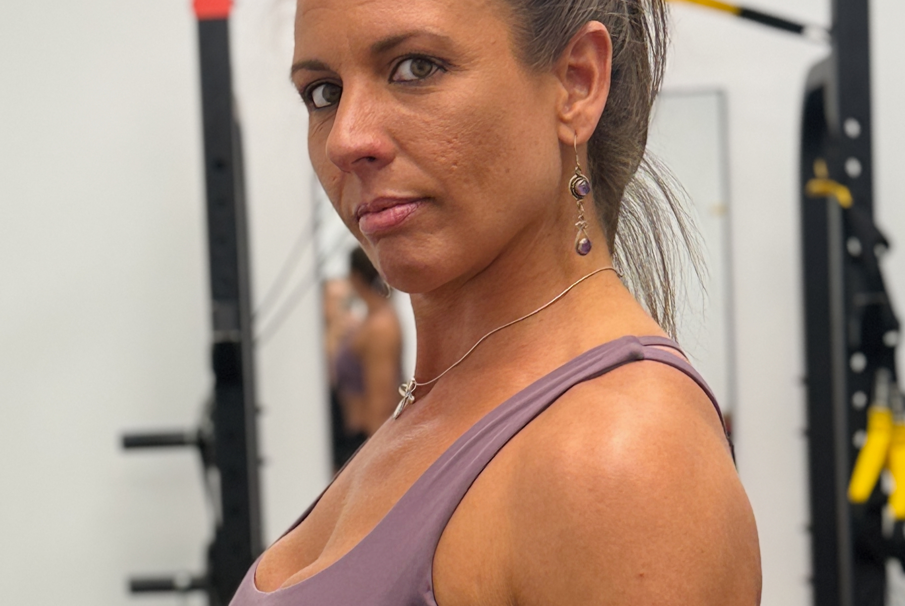 Casey Lauritsen posing in gym wear