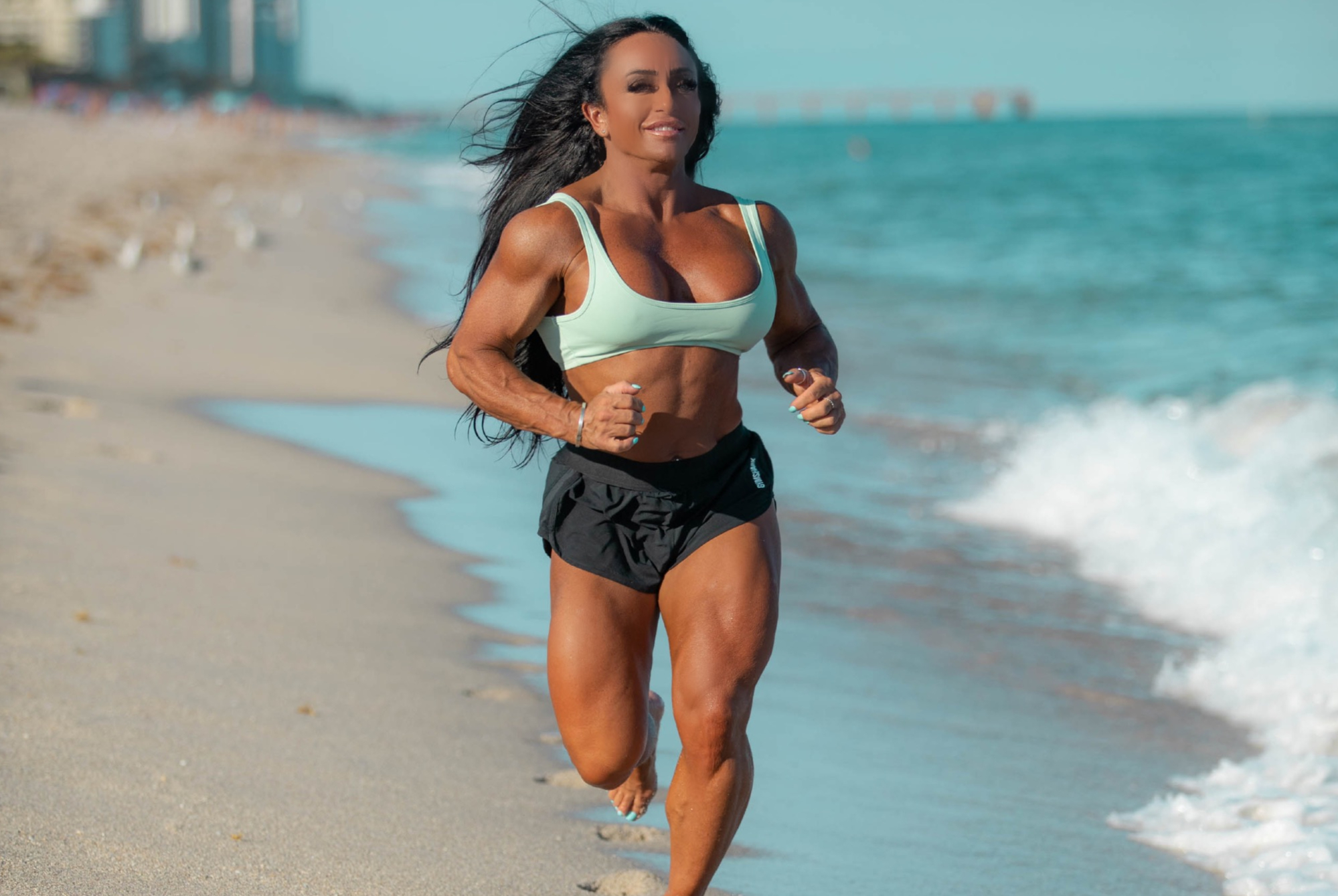 Lisa Smith running on beach