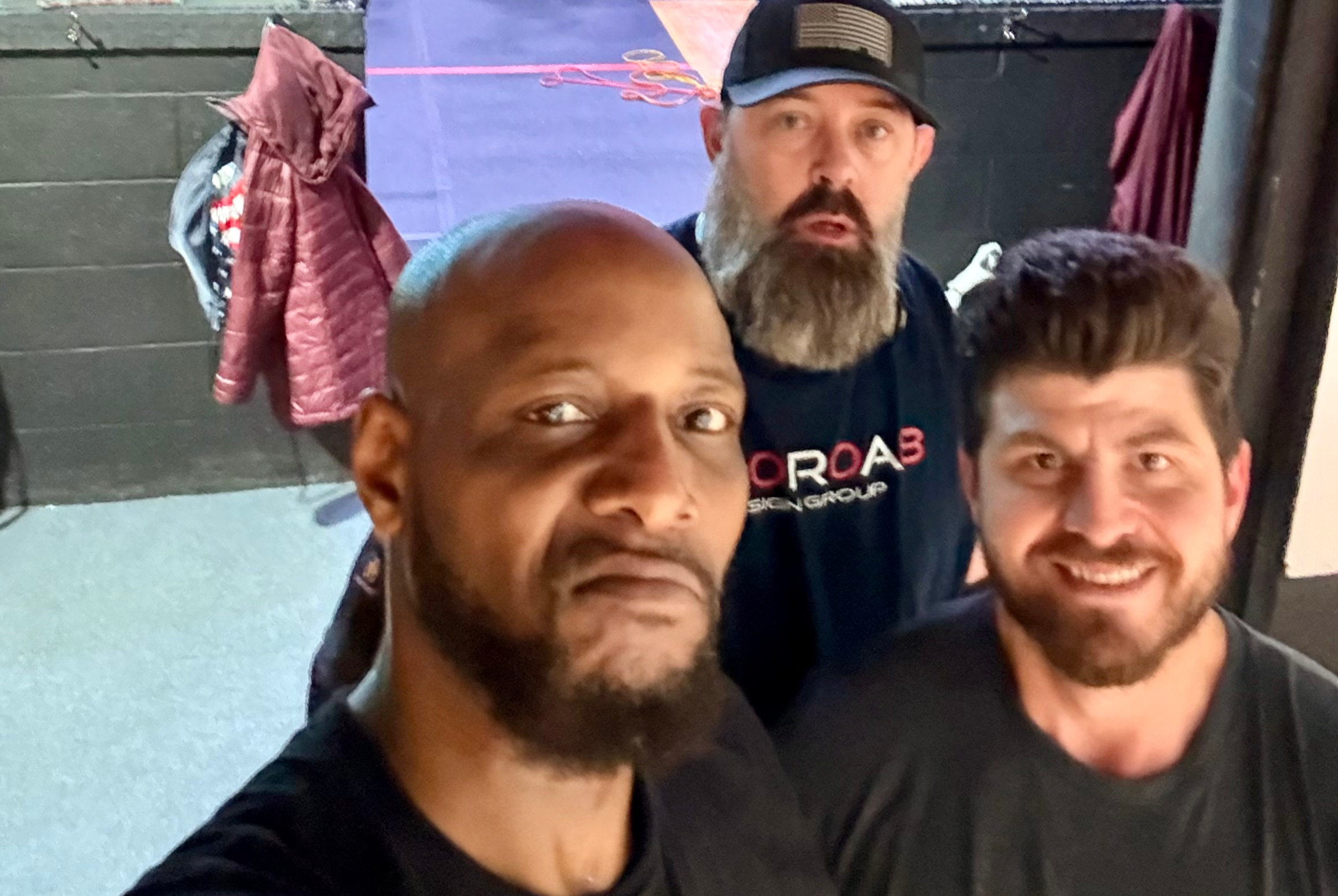 Yusef Dibbles with two male clients