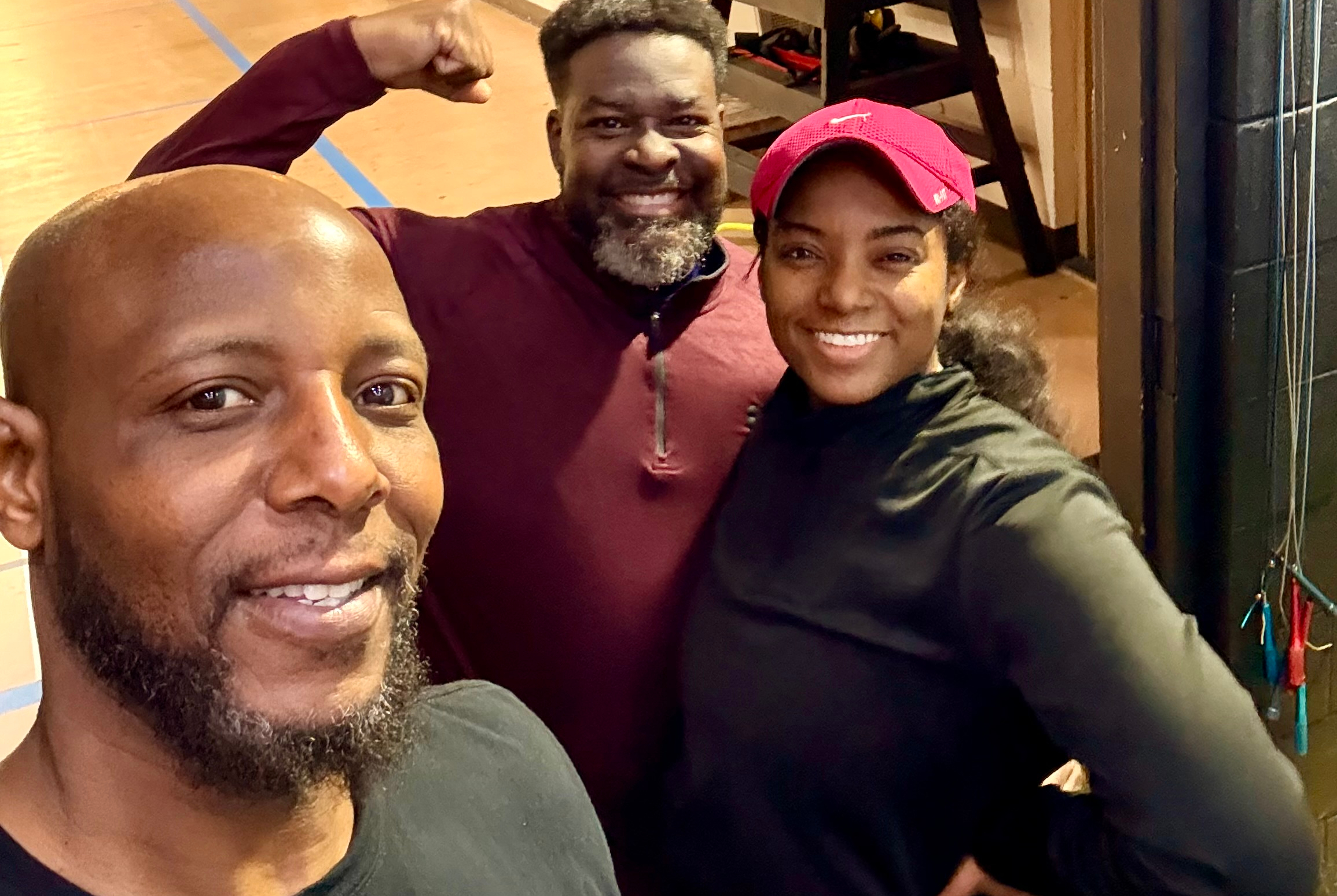 Yusef Dibbles with a male and female client