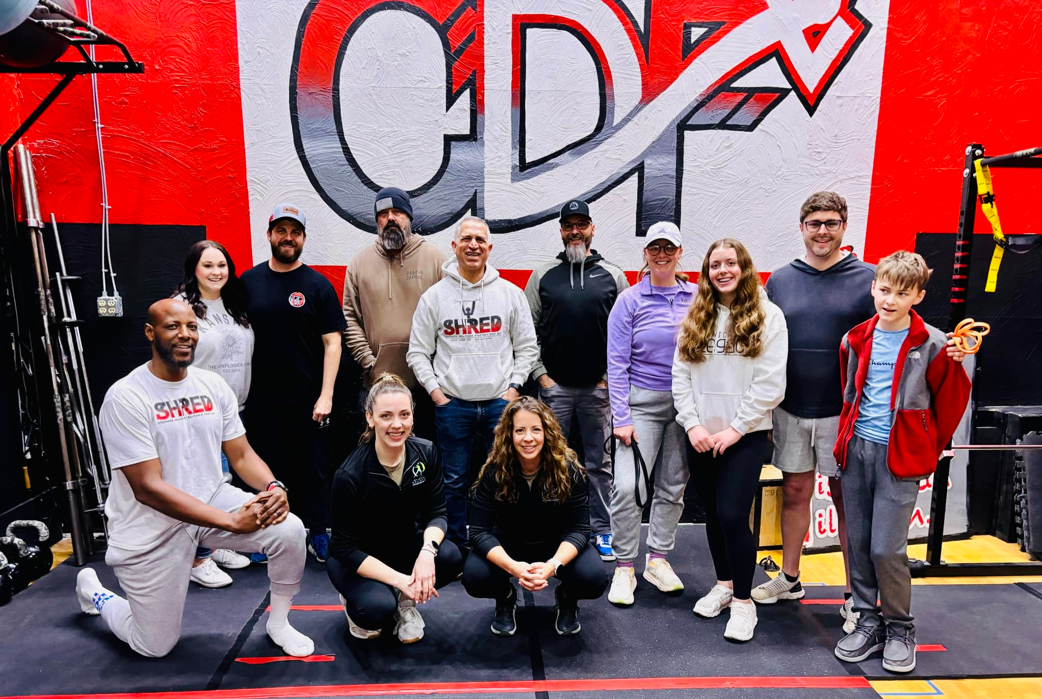 Yusef Dibbles with a large group of clients at SHRED