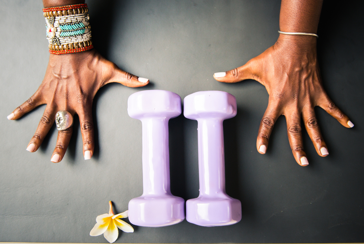 Nadine McNeil doing a balance pose with weights